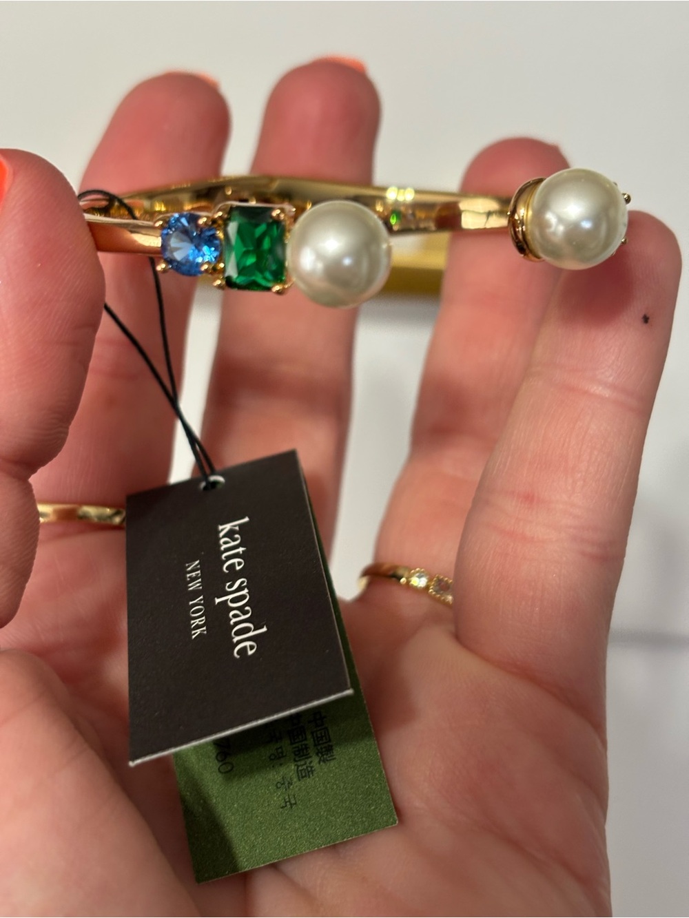 kate spade Gold-Tone Bangle with Pearl and Green & Blue Gem Accents